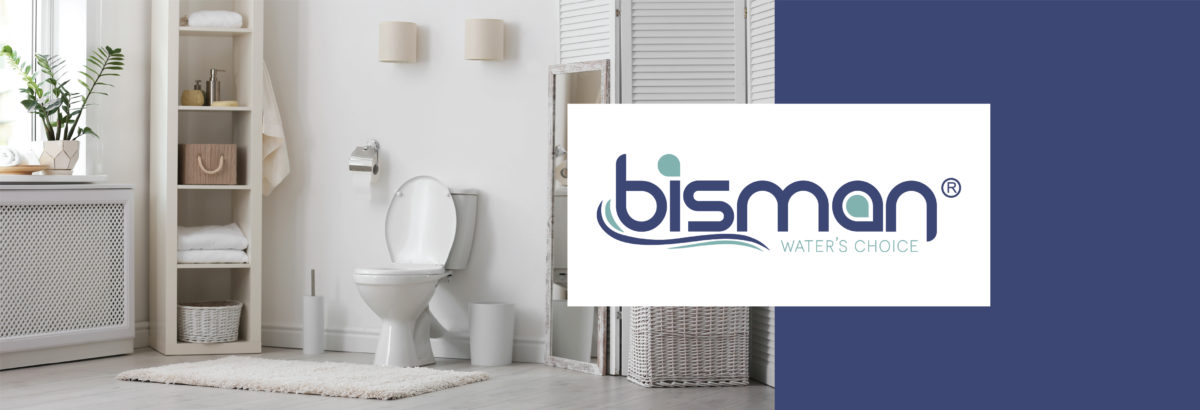 A modern, minimalist bathroom featuring a white toilet, a small shelving unit with towels and toiletries, and a plant by the window. The logo for ‘Bisman Water’s Choice’ is prominently displayed on the right side of the image with a blue background.