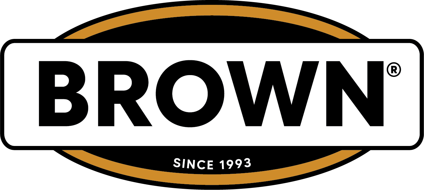 Brown brand logo with bold black lettering inside a white rectangular box, framed by a black and gold oval, with ‘Since 1993’ written beneath.